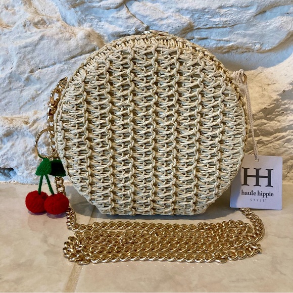 Haute Hippie Handbags - NWT Haute Hippie Cream Straw Round Crossbody with Red Cherry Charm